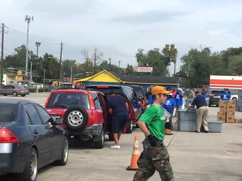 Members of the SMBC Young Professionals Community volunteering with Hurricane Harvey cleanup in Houston's 5th Ward