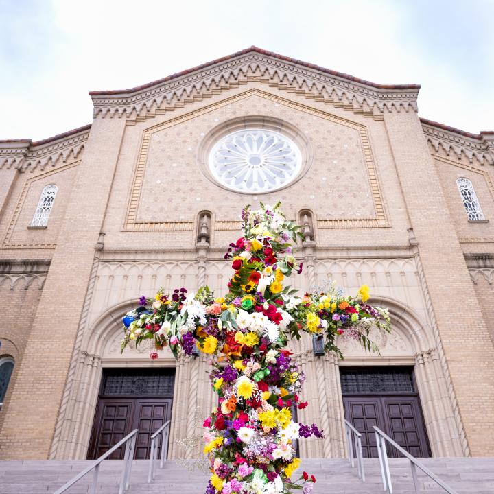cross made of flowers in front of the south main sanctuary